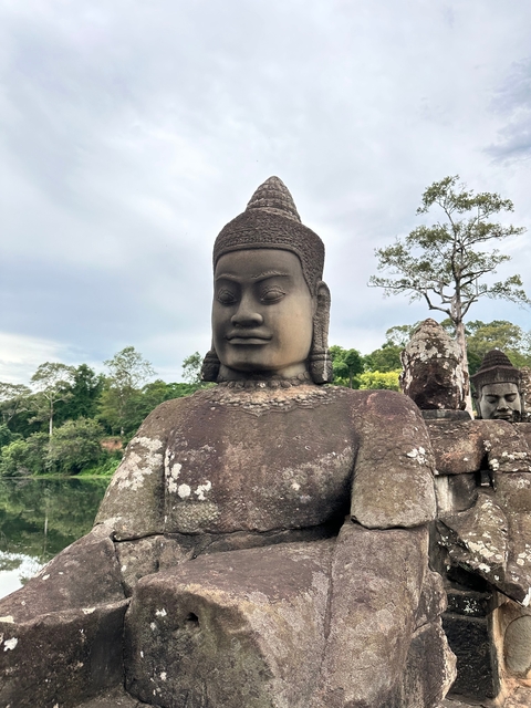 Angkor sculpture with serene expression.