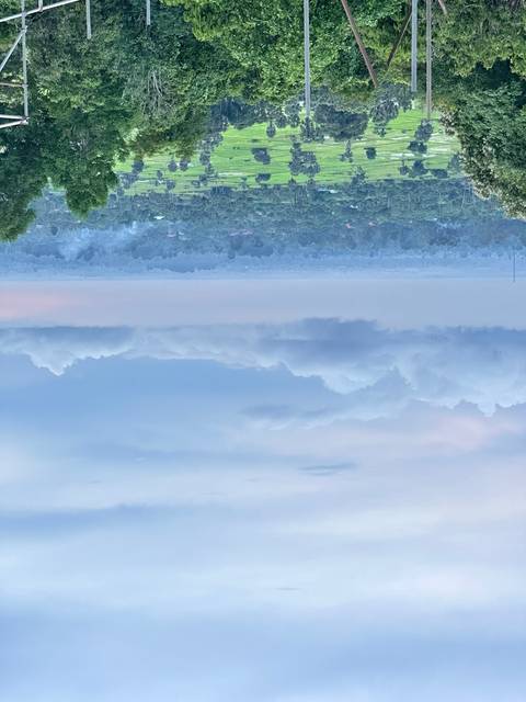 Landscape view of a scenic area with clouds in the sky.