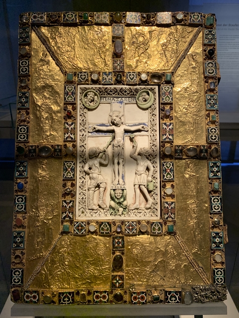 Intricate religious artwork depicting a crucifixion scene.