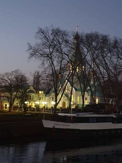       Church illuminated at dusk.
  