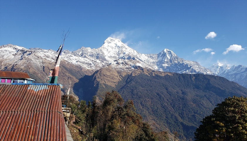 Snow-capped mountain range with a clear sky.