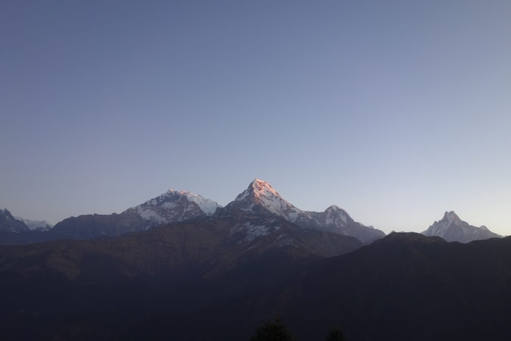       Snow-capped mountains during sunrise.
  