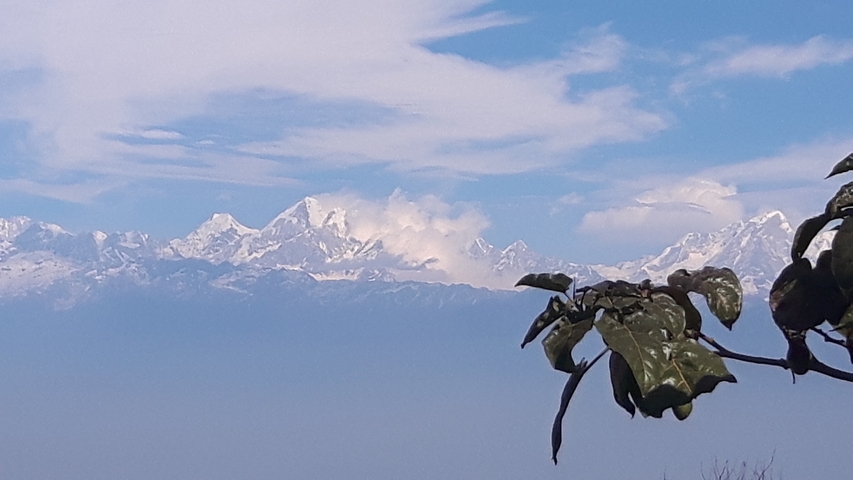 Snowy mountain peaks with clear sky.