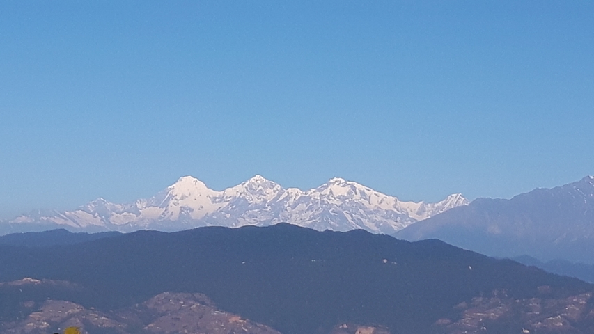 A close-up of snowy mountains.