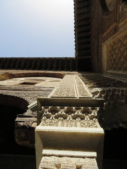 Ornate Moroccan architectural detail featuring columns and carvings.