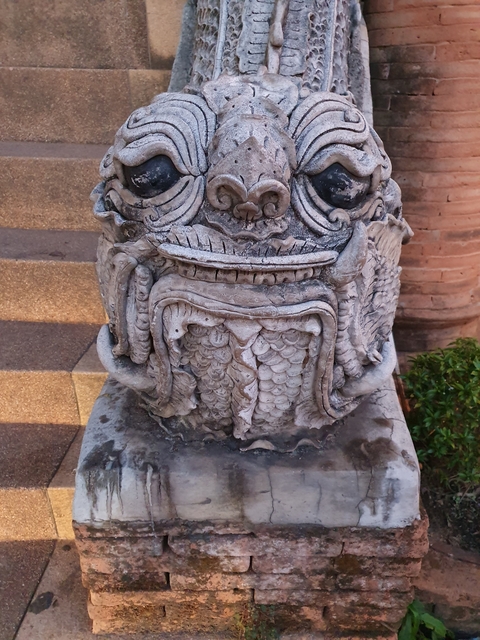 Ornate stone sculpture with intricate details.