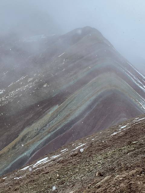       Side view of Rainbow Mountain landscape
  