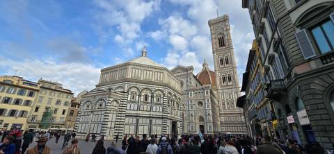 Florence Cathedral with many visitors in front.