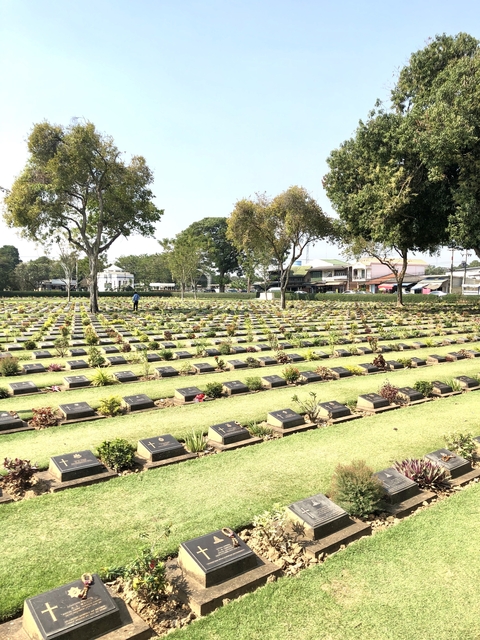 Neat rows of graves in a cemetery.