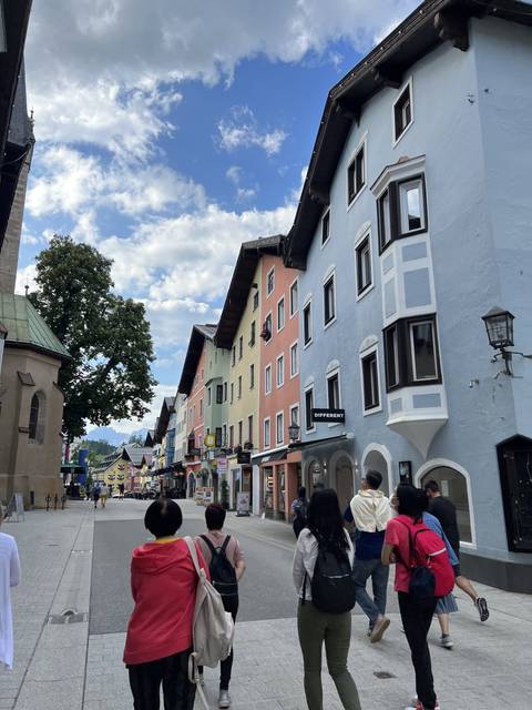       Street with colorful buildings in a European town.
  