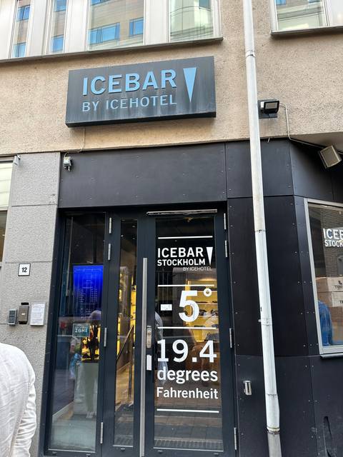       Entrance to the Icebar by Icehotel with signage displaying temperature.
  