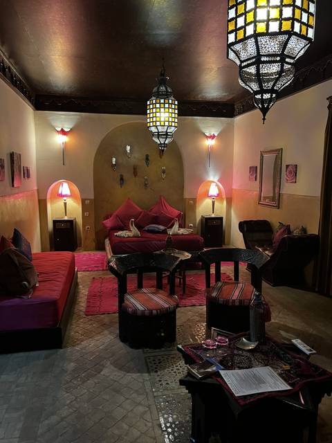 Interior of a traditional room with colorful lighting.
