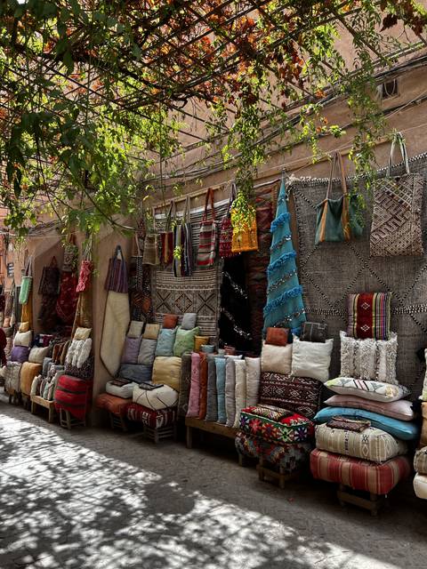 A market selling decorative textiles and crafts.