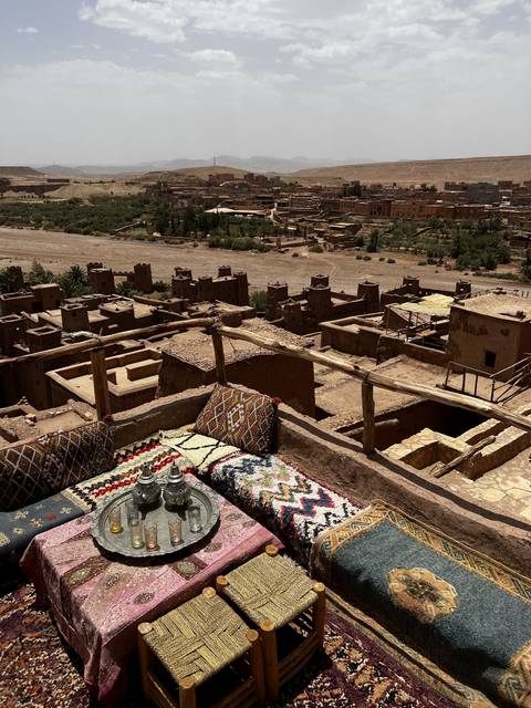 A rooftop view of a town with traditional architecture.