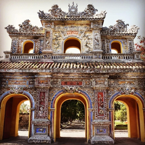       Intricately decorated ancient gateway with vibrant colors.
  