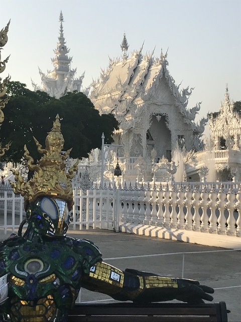 White temple structure with intricate designs.