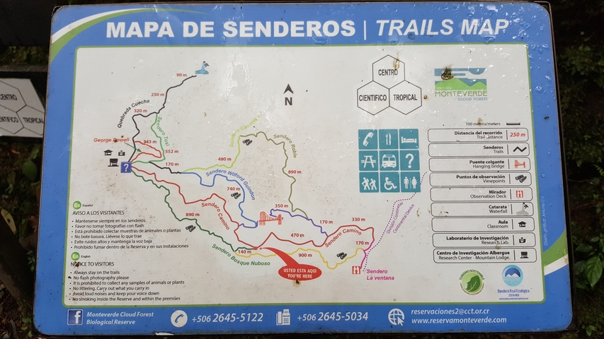 Signboard with trail map and information.