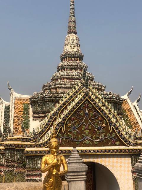       Temple with an ornate spire and decorative elements.
  