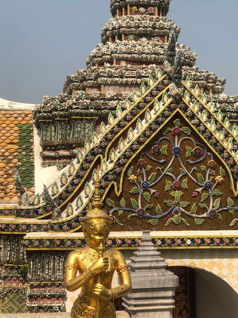       Temple with an ornate spire and decorative elements.
  
