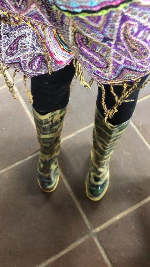 A pair of muddy boots.