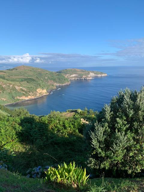 Coastal landscape with cliffs and ocean views.