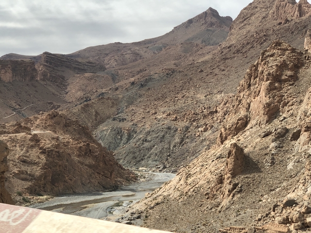 Rocky gorge with a winding river below.