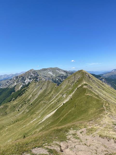 Rolling hills in a mountainous landscape.