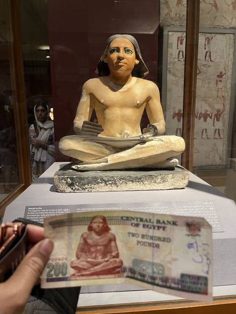 Museum artifact with a currency note