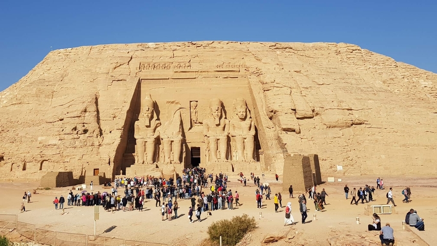 Great Temple of Abu Simbel with many visitors.