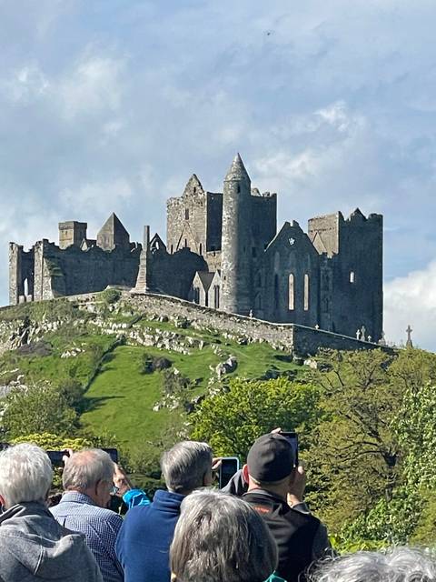 Tourists viewing a historical site.