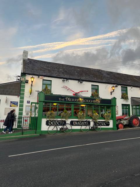 Traditional Irish pub with bicycles parked outside.