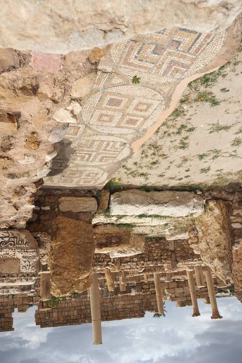       Ancient Roman ruins with mosaic flooring.
  