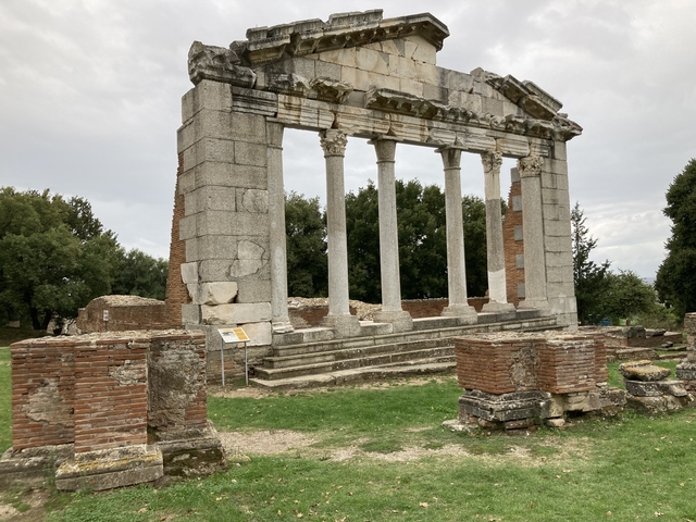 Ancient ruins with stone columns.