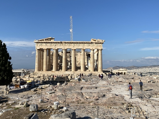       The Parthenon in Athens with visitors.
  