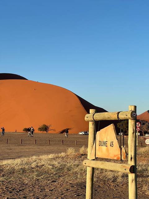 Sign reading 'Dune 45' with desert landscape.