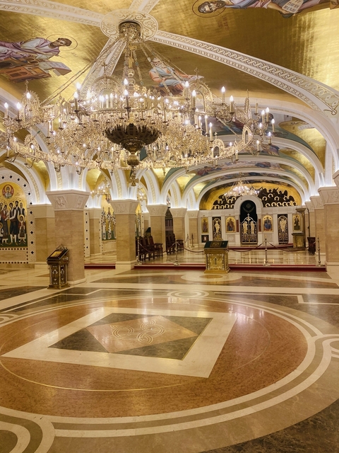       Interior of an ornately decorated church or cathedral.
  