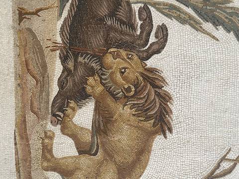 Detailed mosaic showing a lion attacking prey.