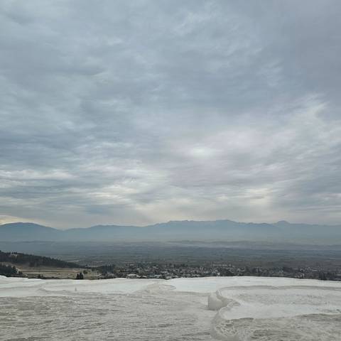 Upside-down view of a cloudy sky.