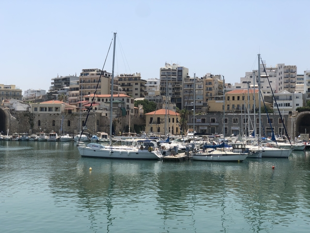       Marina with boats and buildings in the background.
  