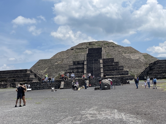       Tourists exploring the Pyramid of the Sun
  