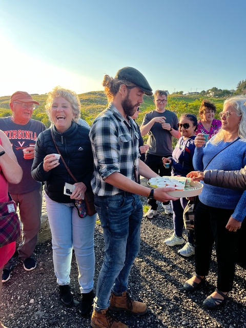 Group enjoying outdoor drinks together.