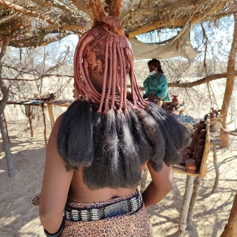 Close-up of a person's traditional hairstyle.