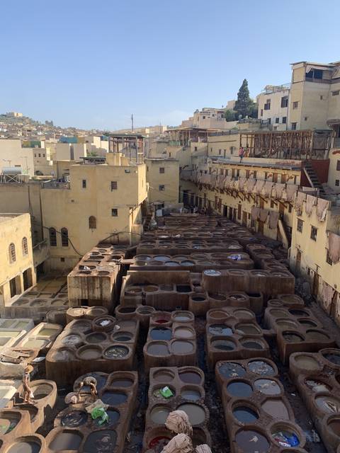       View of the Chouara Tannery in Fes, Morocco with stone dyeing pits.
  