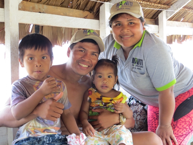 Family portrait with two adults and two children.