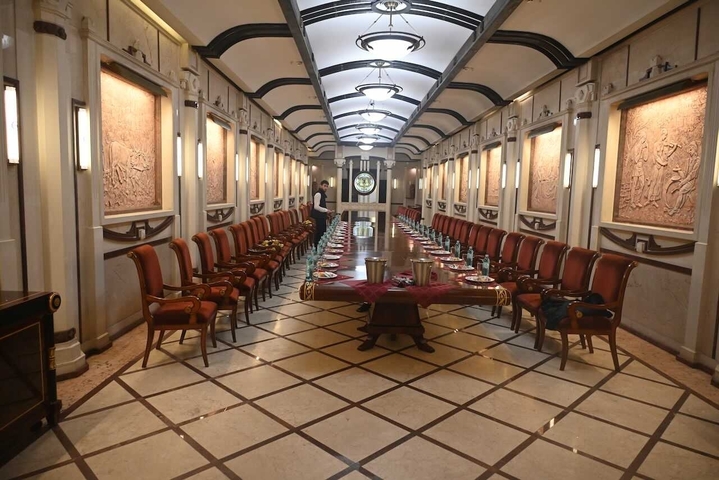       Elegant dining room set for a banquet.
  