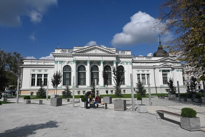      Historical building with an open plaza.
  