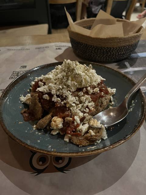       Plate with meat and sauce
  