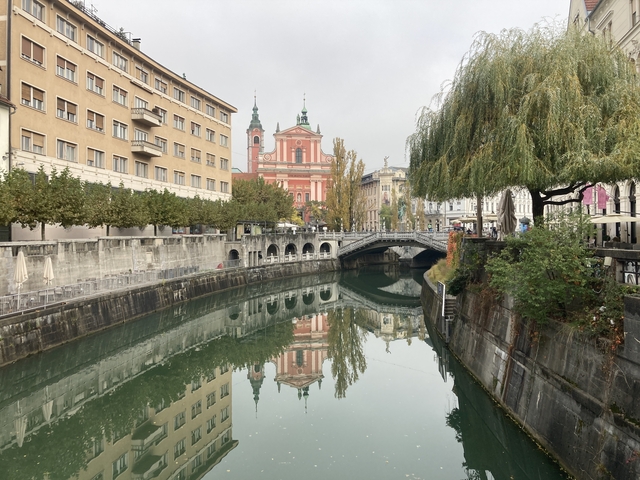       Canal with historic buildings in Ljubljana.
  