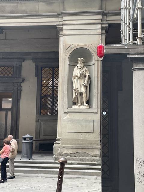       A statue within an architectural alcove.
  