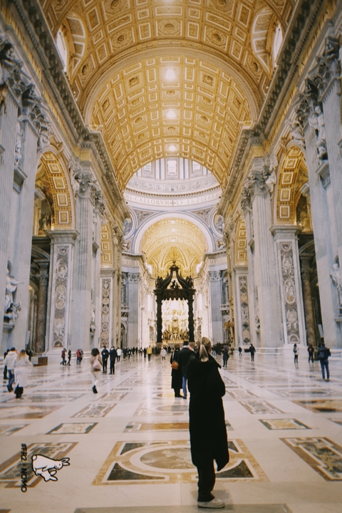       Interior of a richly decorated church.
  